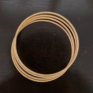 Premier Designs sparkle gold 4 bangle bracelets.